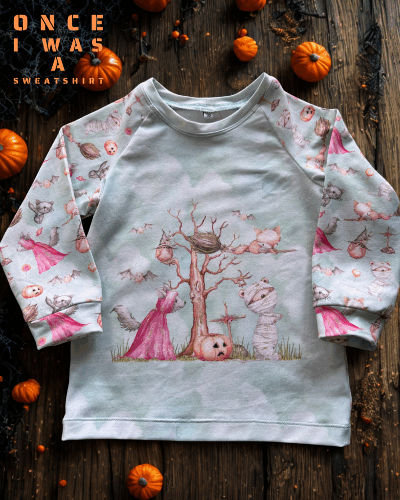 Kids long sleeve with delicate Halloween motifs in mint green